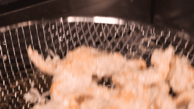 Fried pork taken out of hot oil