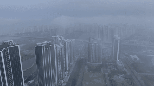 Foggy cityscape with tall buildings