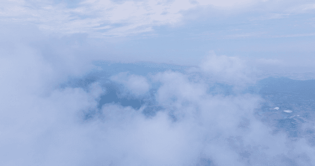Clouds covering a vast landscape
