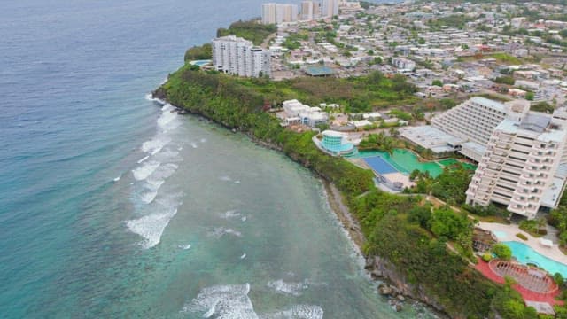 Coastal city with hotels and blue sea