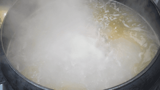 Boiling broth in a large pot