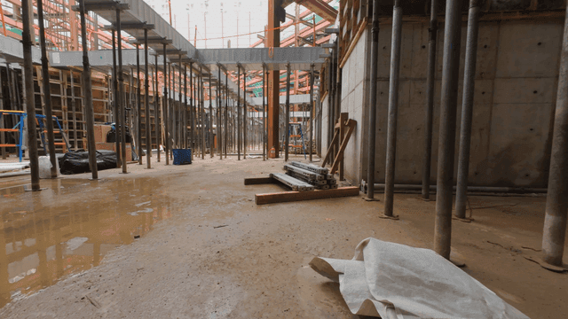 Construction site with metal beams and scaffolding