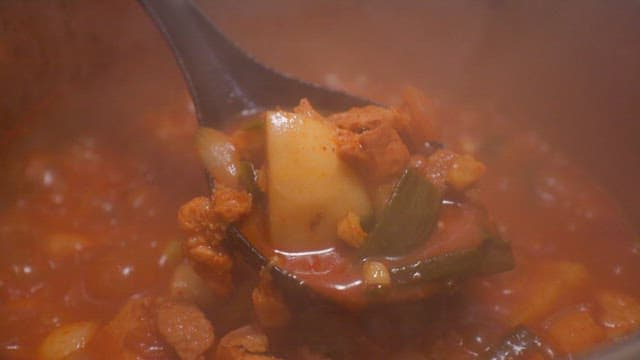 Kimchi stew boiling in a pot