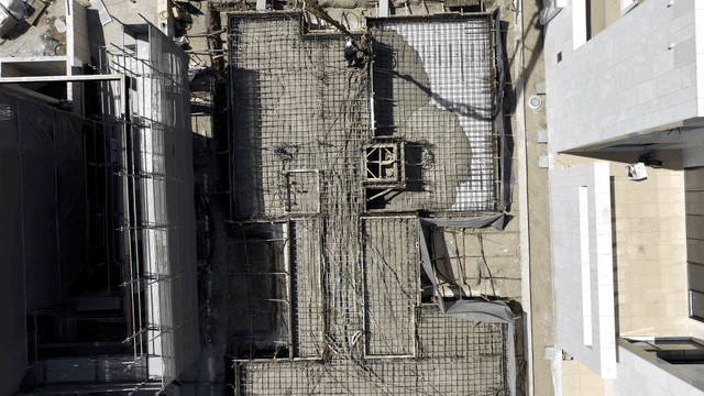 작업자와 기계가 있는 건설 현장