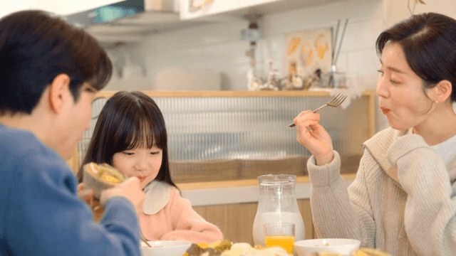 Family enjoying a meal together at home