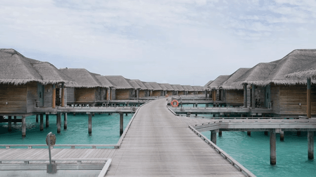 Overwater bungalows on a clear day