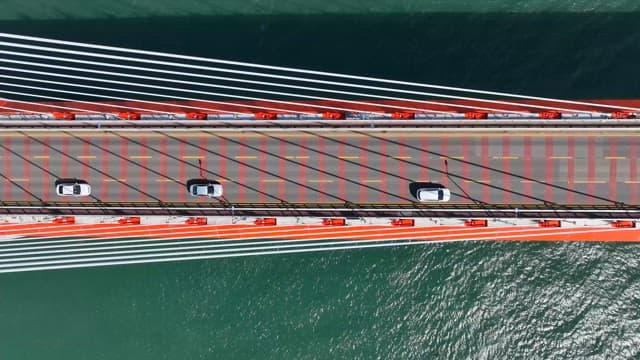 Cars driving on a bridge over water