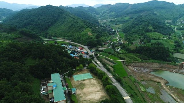 Green Panoramic View of a Mountain Village