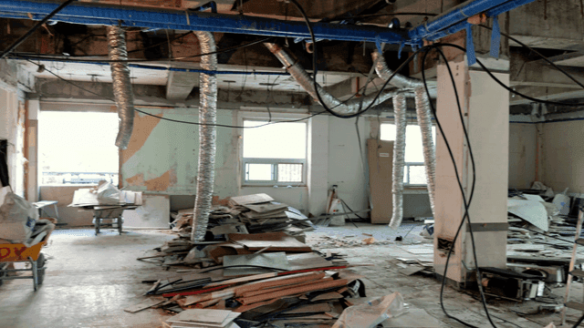 Interior under renovation with debris