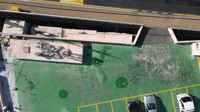 Cars on a road and parking lot