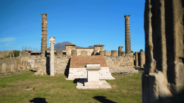 Ancient ruins with distant mountains