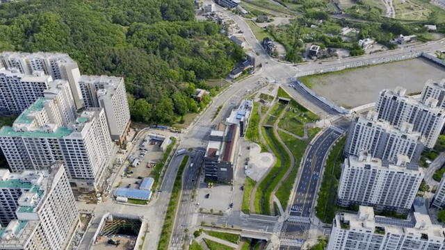 Aerial view of a city with tall buildings