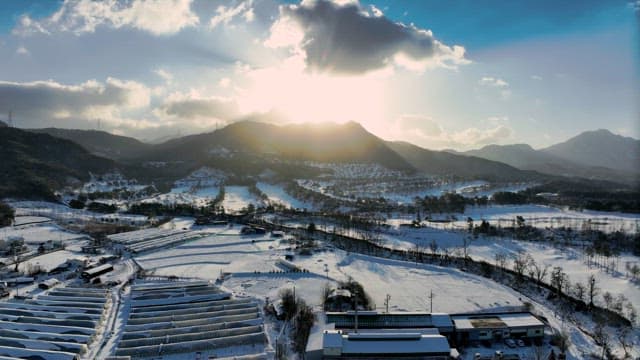 Snowy Landscape at Sunset