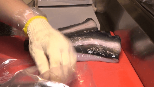 Place eel on red cutting board