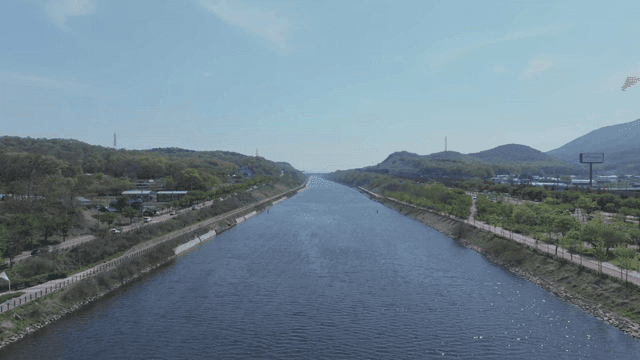 Wide river sparkling in clear weather