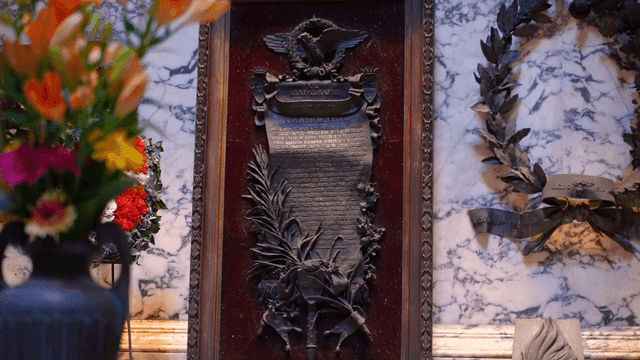 Decorative plaque with floral arrangements