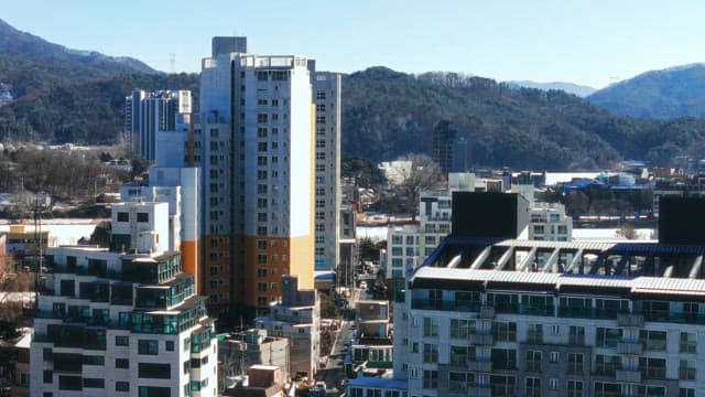 Cityscape Against Mountain on Clear Day