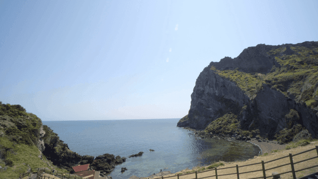 Serene coastal view with cliffs