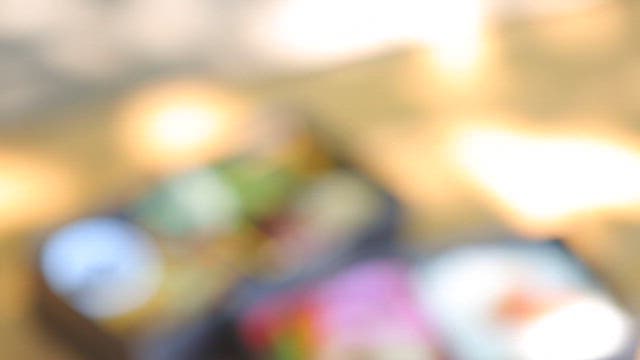 Bento Boxes on Wooden Table Outdoors