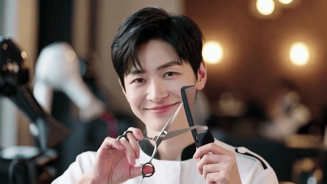 Hairdresser holding scissors