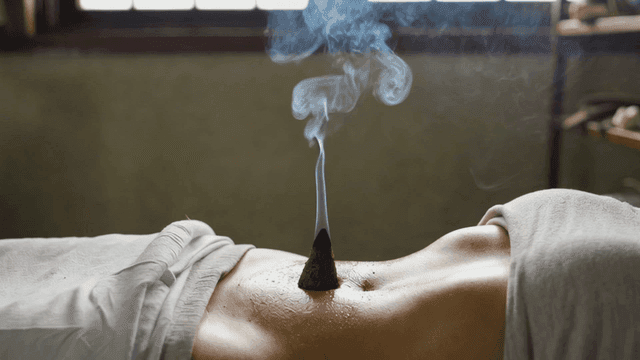 People receiving moxibustion treatment