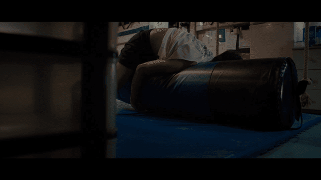 Sandbag and collapsed person on mat