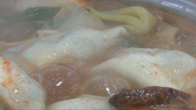 Boiling Dumplings in Spicy Broth