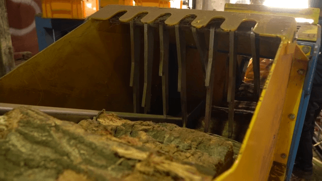 Wood being processed in a machine