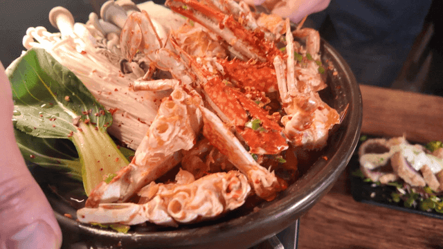 Pile of crab stew being served