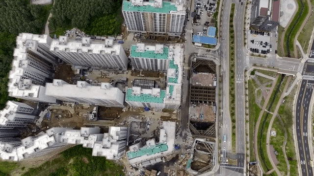 Aerial view of urban buildings and greenery