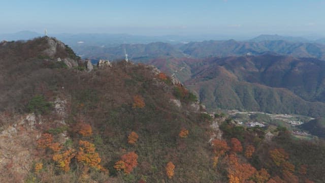 Colorful autumn mountains with rocky peaks