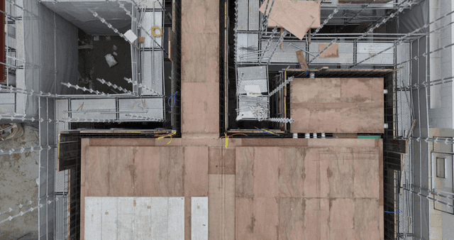 Construction site with scaffolding and workers