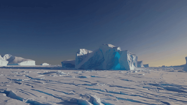 Vast icy landscape with towering icebergs