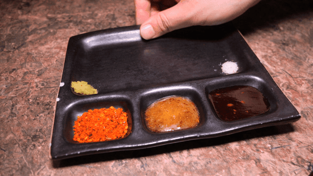 Plate with various spices and sauces