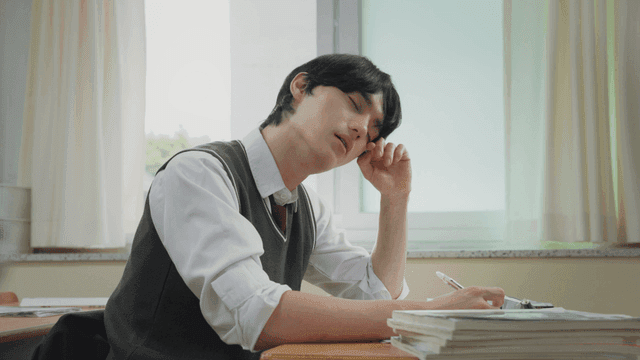 Student feeling tired while studying