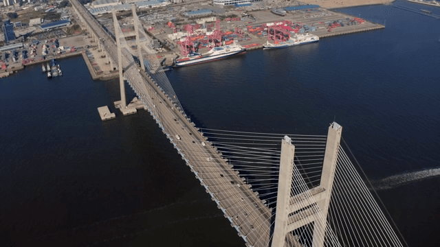 Long bridge over a busy port