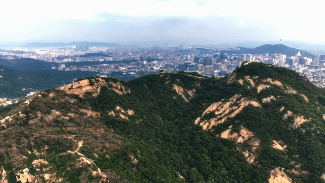 Mountain view with city skyline