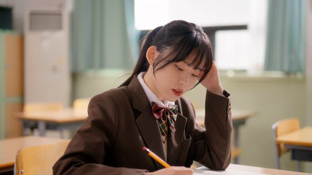 Student studying in a classroom