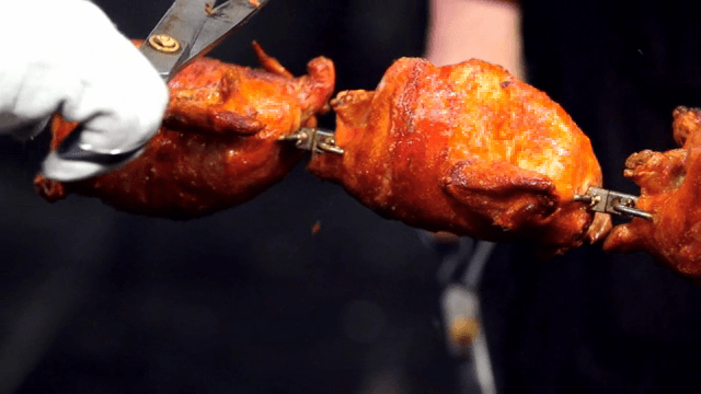 Rotisserie chicken being prepared