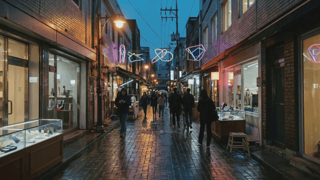 Bustling alley with neon lights at night