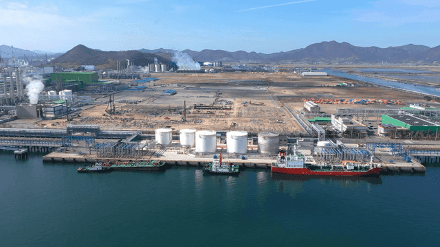 Industrial complex with ships docked