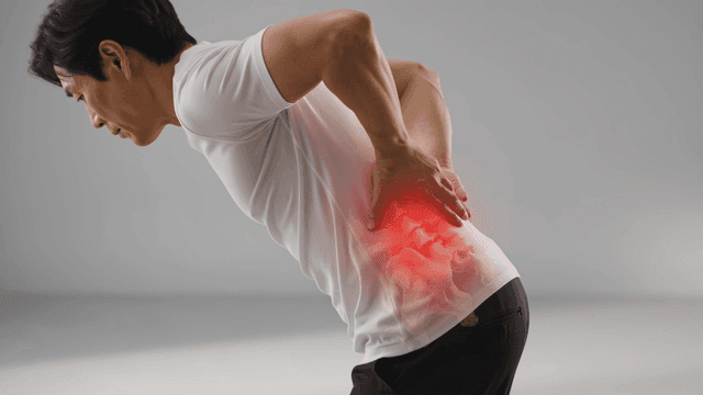 Men suffering from back pain