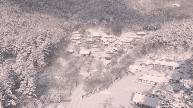 Snow-covered traditional Hanok village