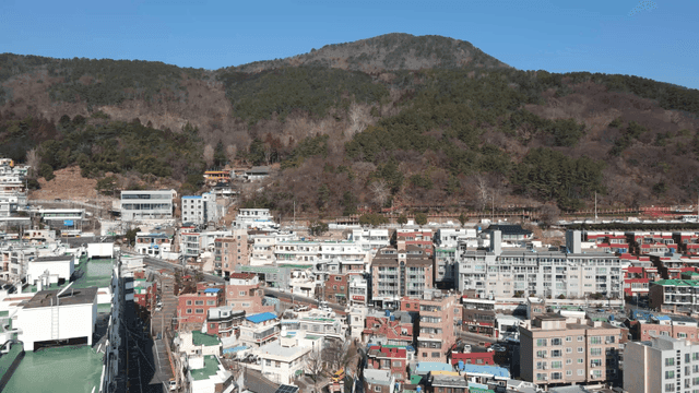 Cityscape with mountains in the background