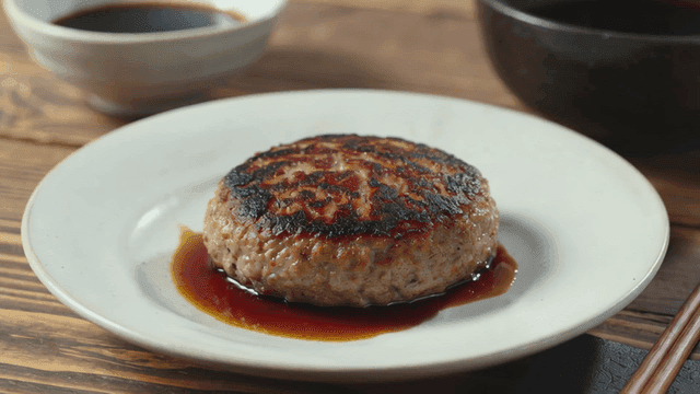 Plate with sauce and hamburger steak