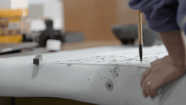 Person who writes calligraphy with brush