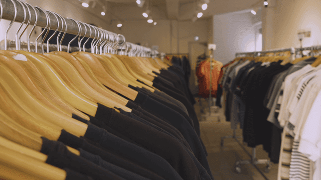 Clothing store with neatly arranged racks