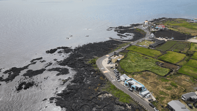 Coastal village with rocky shoreline