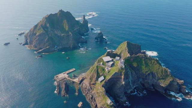 Rocky islands surrounded by blue ocean