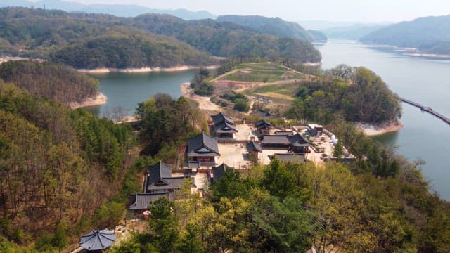 Traditional Korean village by a serene lake